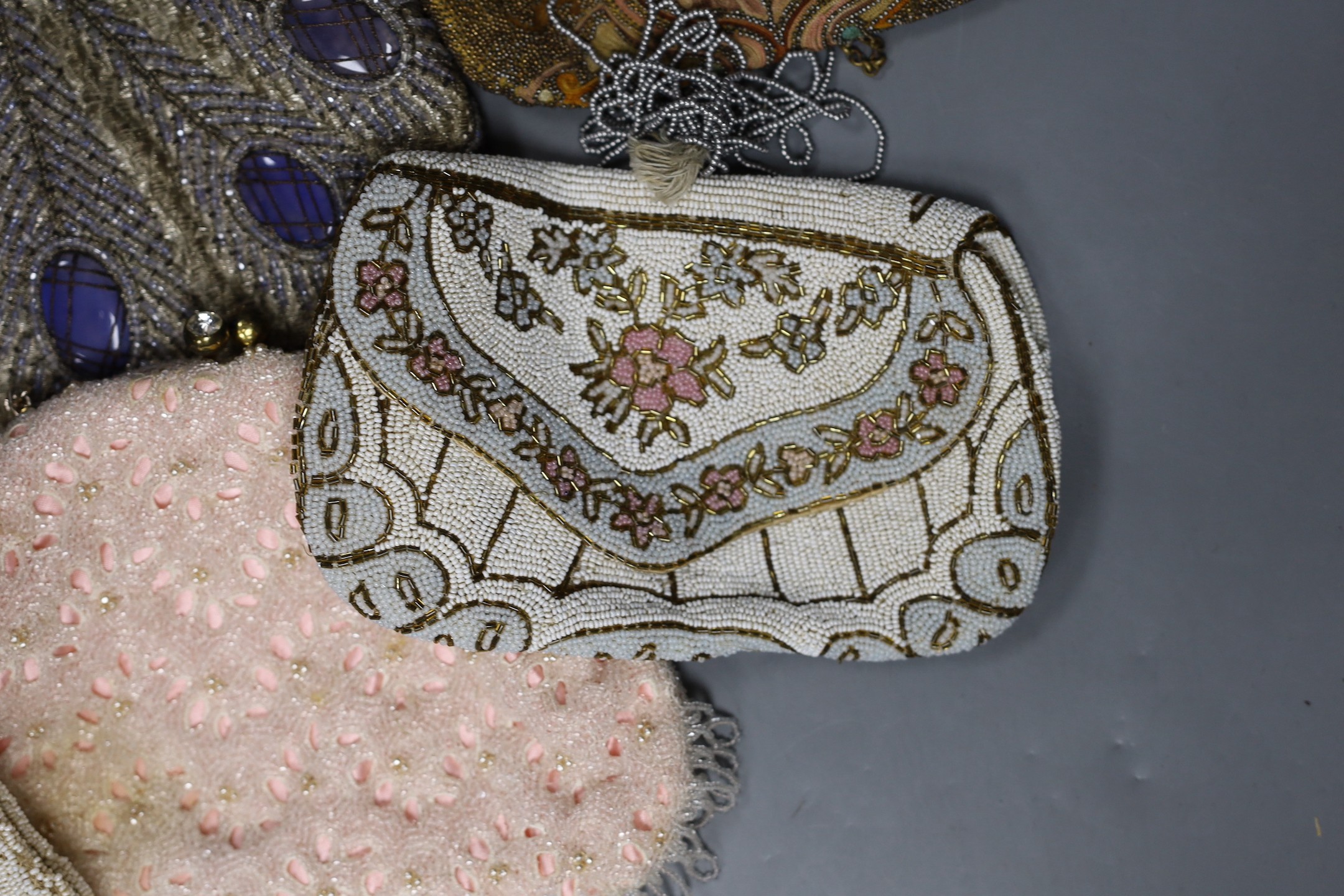 Nine mixed late 19th century to mid 20th century multicoloured bead worked and embroidered evening bags